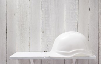 construction-helmet-on-shelf-2021-08-26-17-28-51-utc